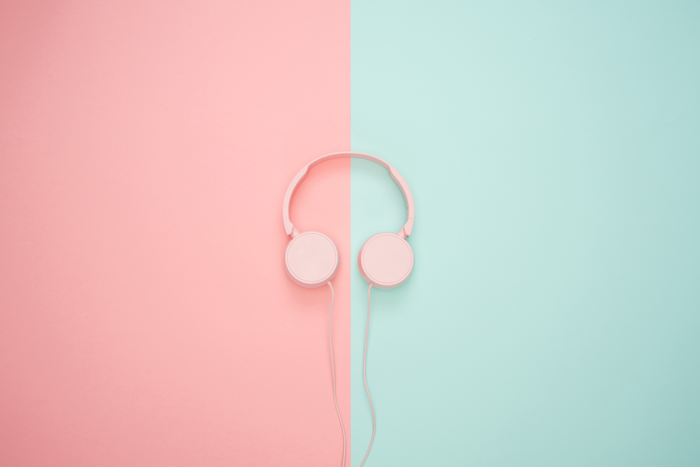 Pink Headphones on a Pastel Background